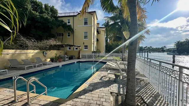a room with furniture and a flat screen tv