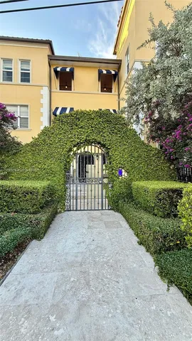 a car parked in front of a house