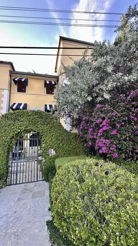 a view of a wooden house with a yard