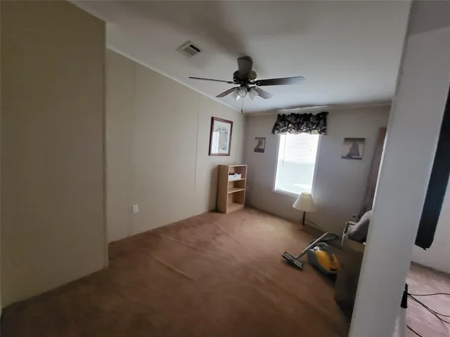 a view of a livingroom with a window