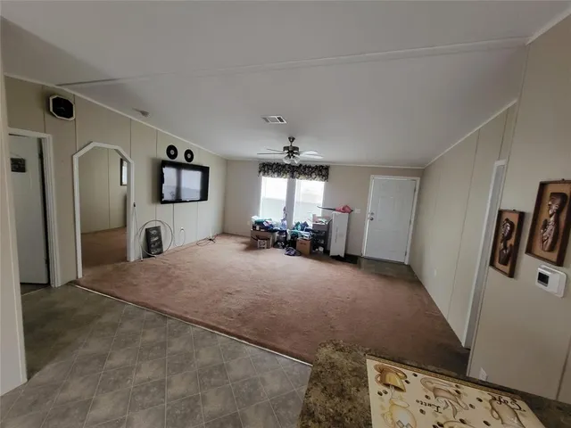 a view of a livingroom with a flat screen tv