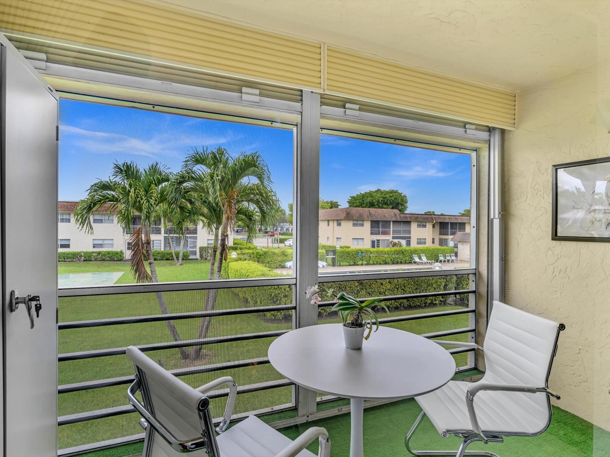 9855 Sandalfoot Boulevard, Unit 320 Boca Raton, FL 33428 - Photo 13 of 23 a room with furniture and a potted plant
