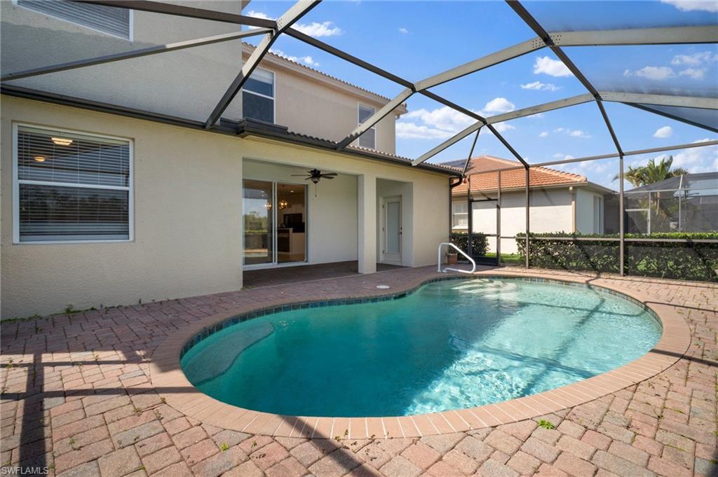 21620 Bella Terra Boulevard Estero, FL 33928 - Photo 33 of 37 a view of a backyard with swimming pool