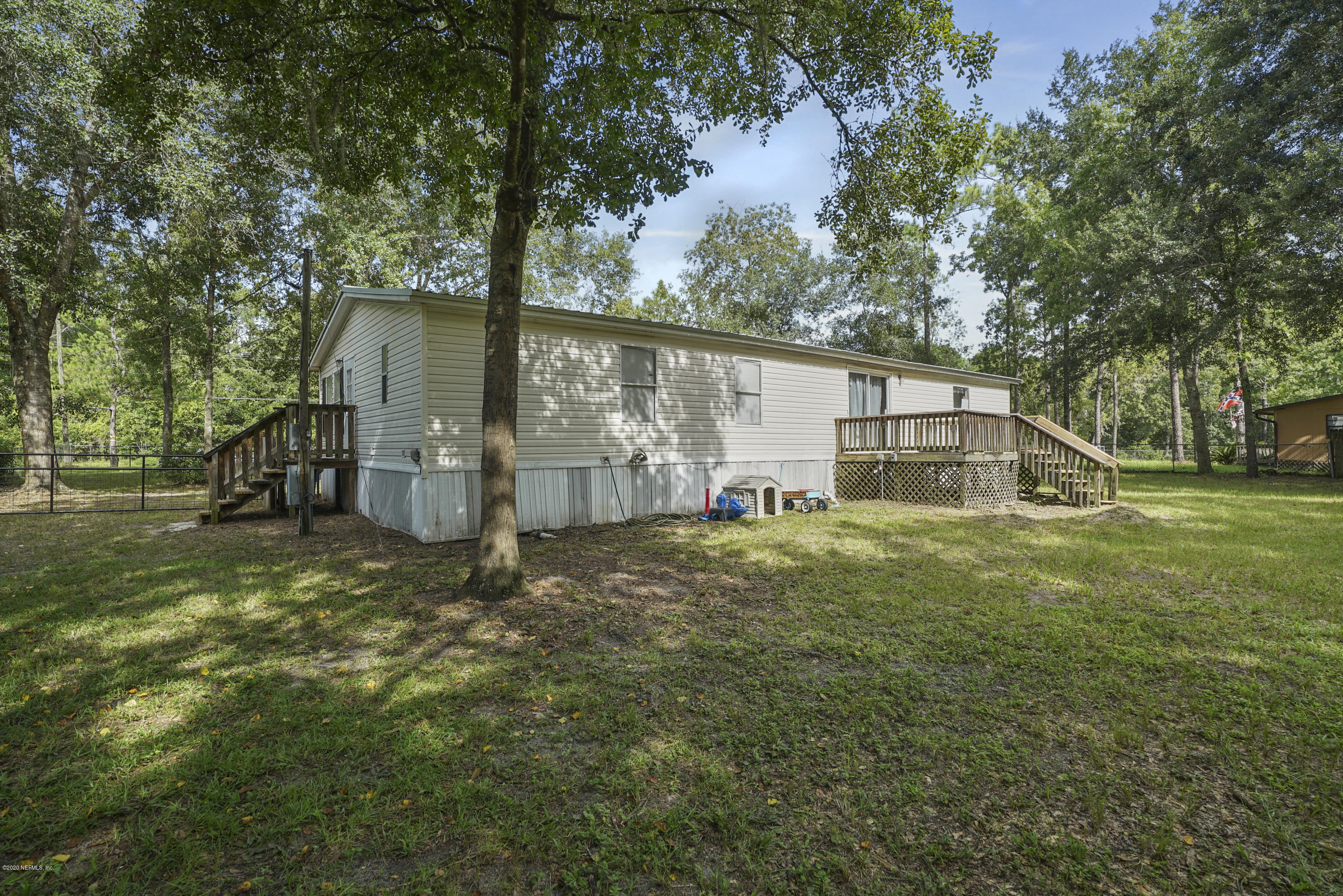 1435 Long Bay Road Middleburg, FL 32068 - Photo 24 of 27 a view of back yard of the house