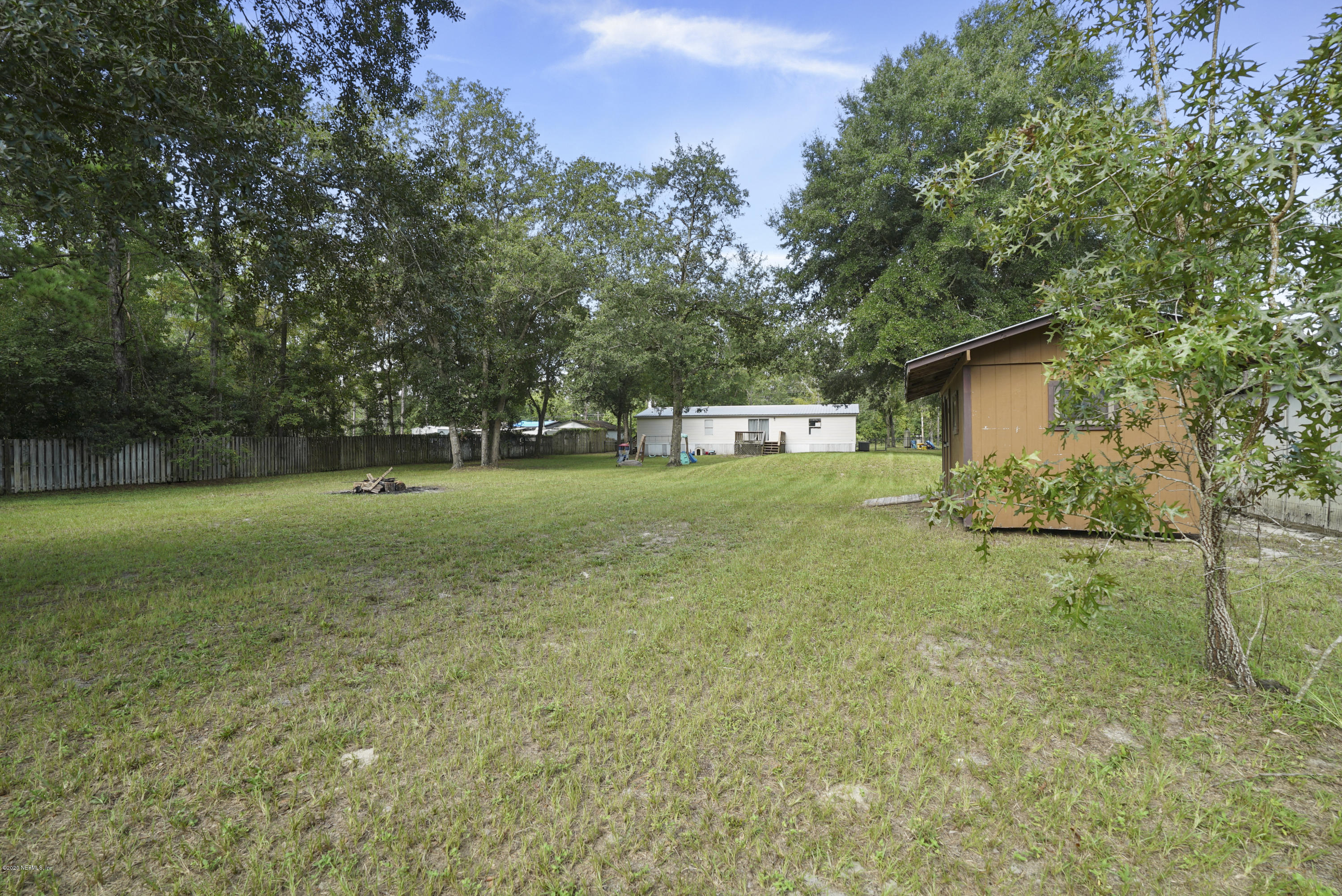 1435 Long Bay Road Middleburg, FL 32068 - Photo 25 of 27 a view of a house with a backyard