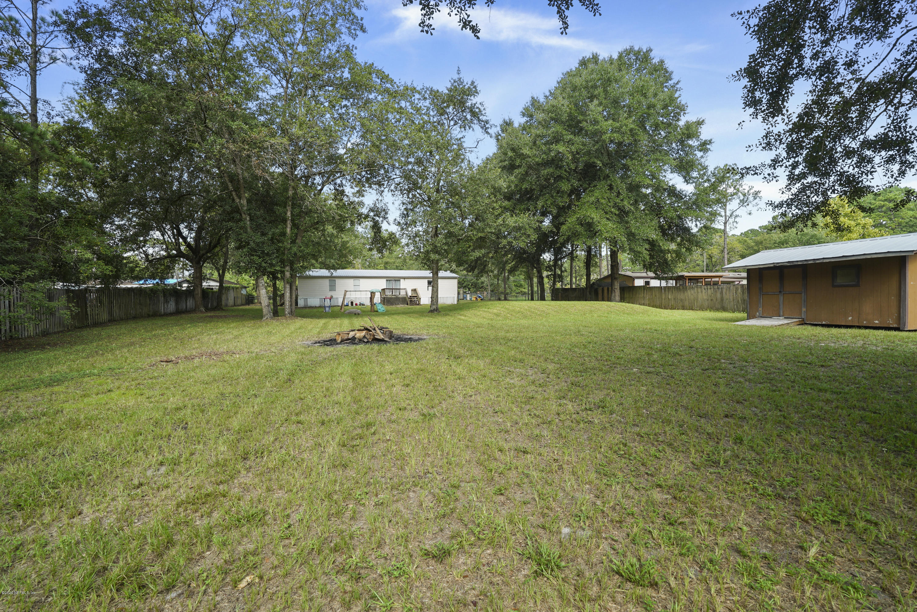 1435 Long Bay Road Middleburg, FL 32068 - Photo 27 of 27 a view of a house with a yard