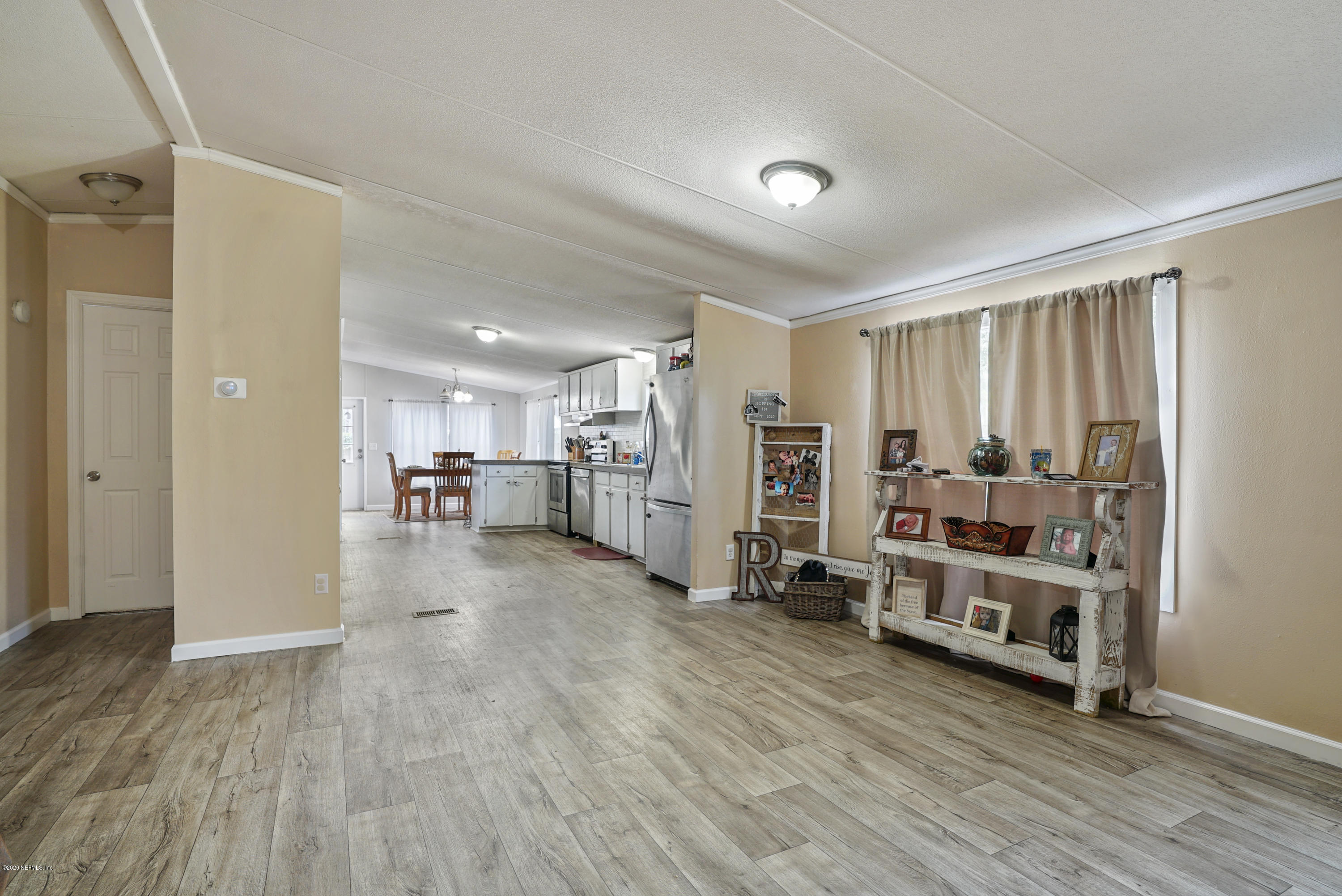 1435 Long Bay Road Middleburg, FL 32068 - Photo 10 of 27 a view of a room with gym equipment and a window