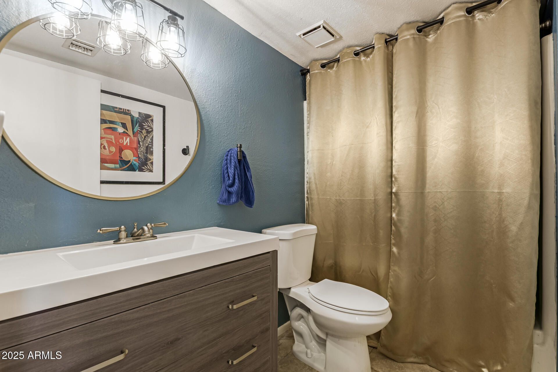 1051 South Dobson Road, Unit 138 Mesa, AZ 85202 - Photo 20 of 28 a bathroom with a sink toilet and a mirror