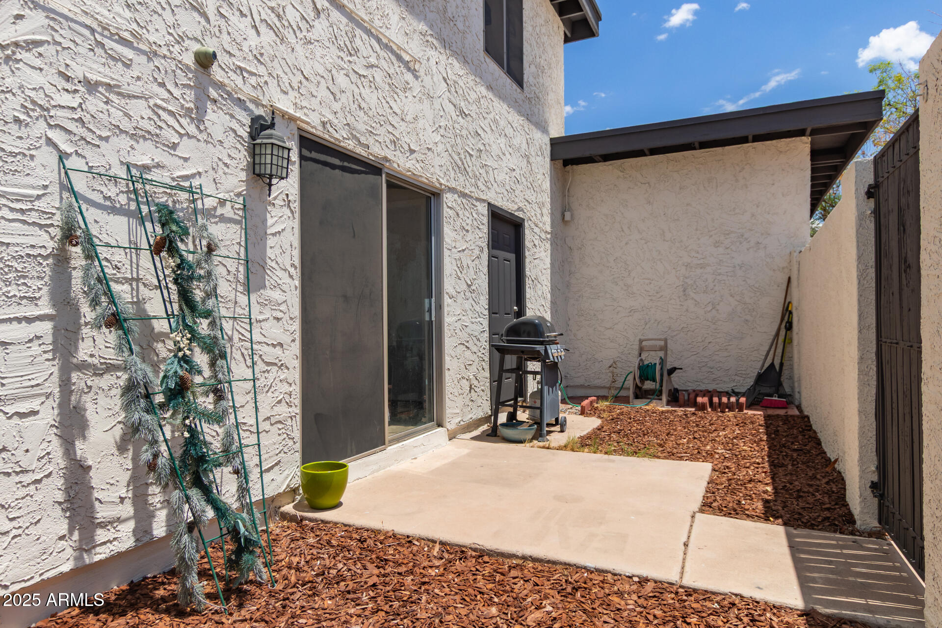 1051 South Dobson Road, Unit 138 Mesa, AZ 85202 - Photo 22 of 28 a bath room with a bed and a table