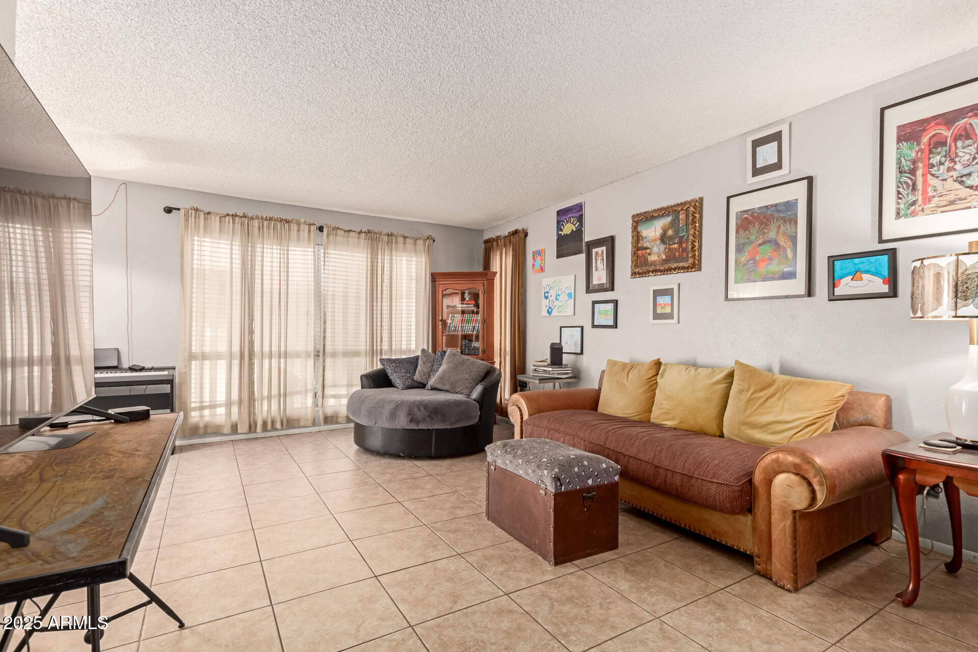 1051 South Dobson Road, Unit 138 Mesa, AZ 85202 - Photo 3 of 28 a living room with furniture and large window