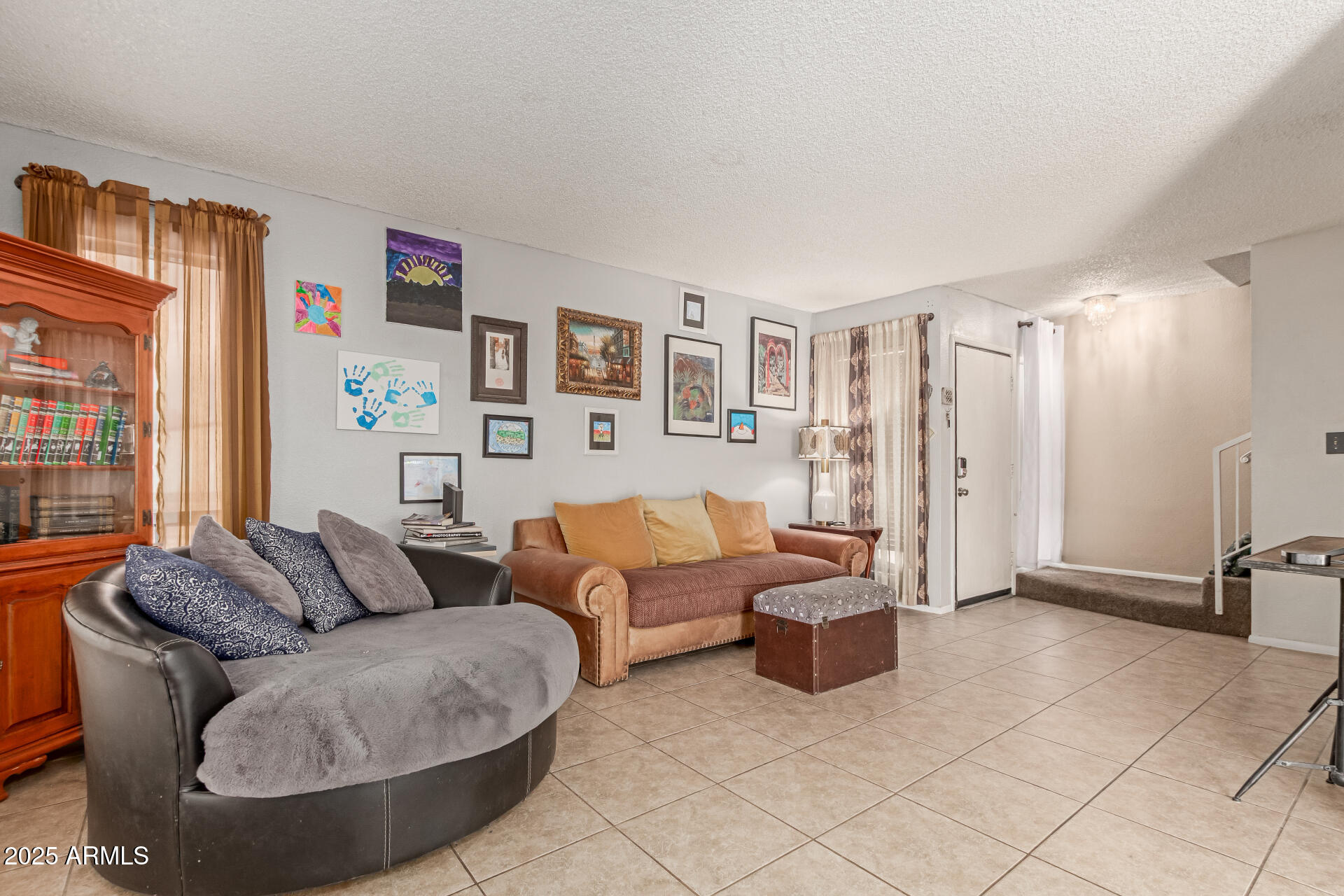 1051 South Dobson Road, Unit 138 Mesa, AZ 85202 - Photo 4 of 28 a living room with furniture and a window