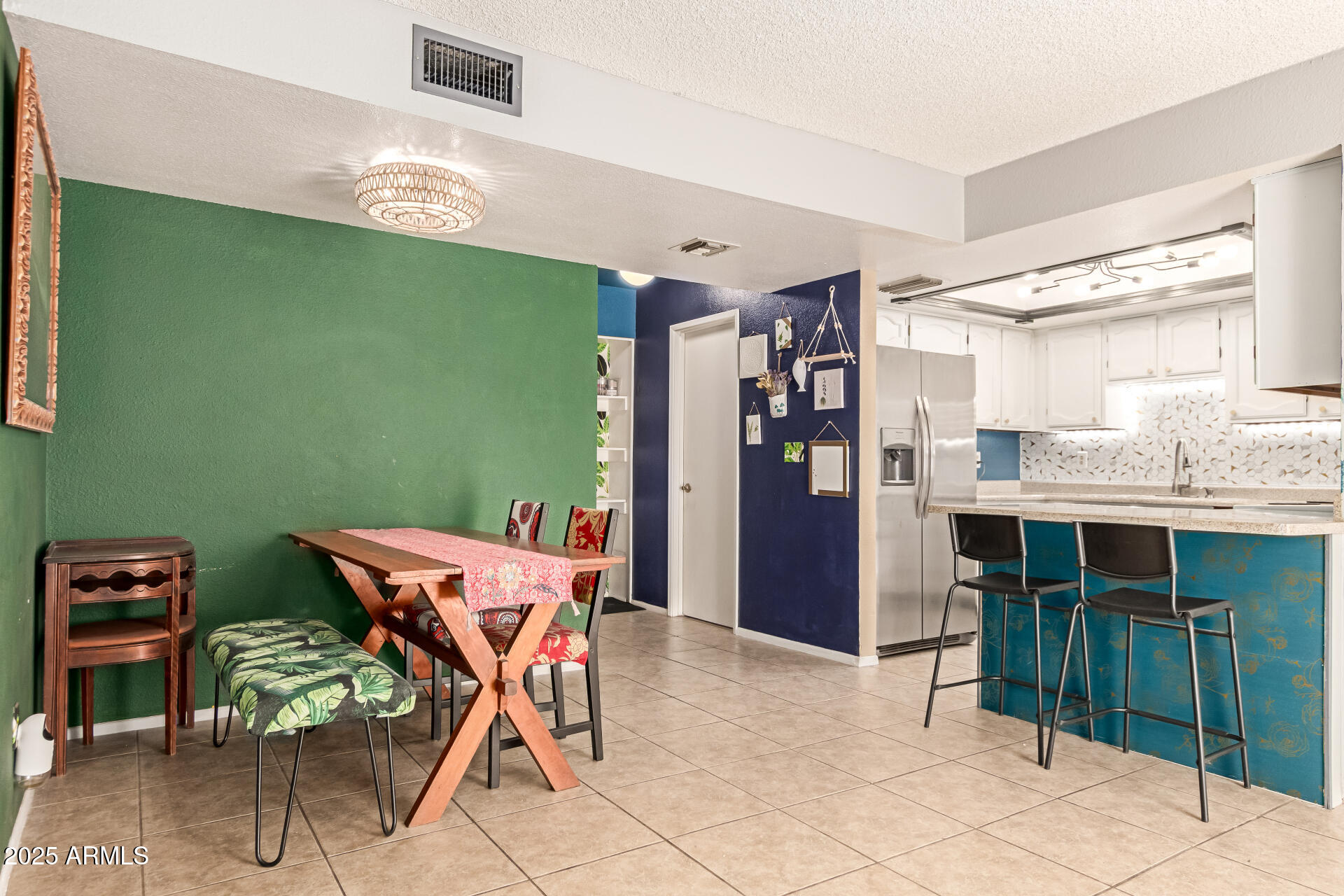 1051 South Dobson Road, Unit 138 Mesa, AZ 85202 - Photo 6 of 28 a view of a dining room with furniture