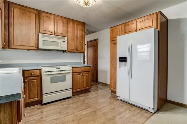 $350,000 | 12009 Merritt Road, Grandview, MO 64030