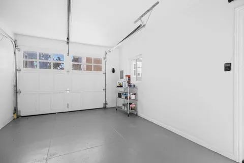 a view of a room with storage and utility room