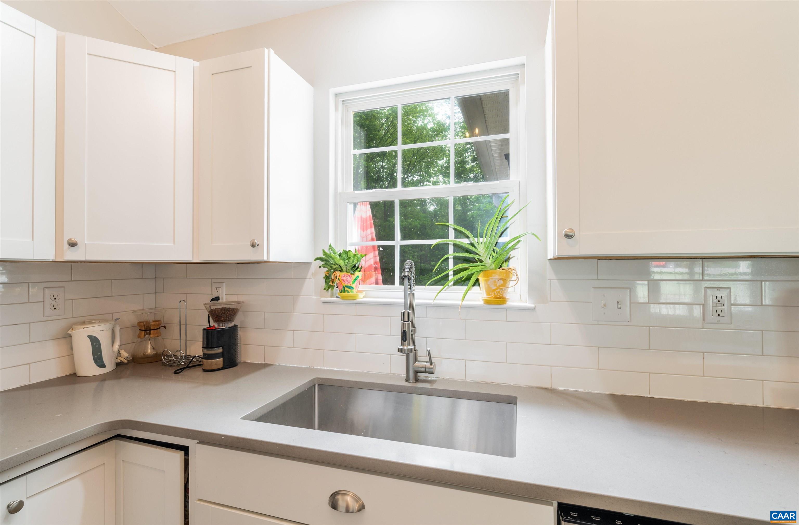 1507 Buck Road Crozet, VA 22932 - Photo 11 of 33 a kitchen with a sink and a window
