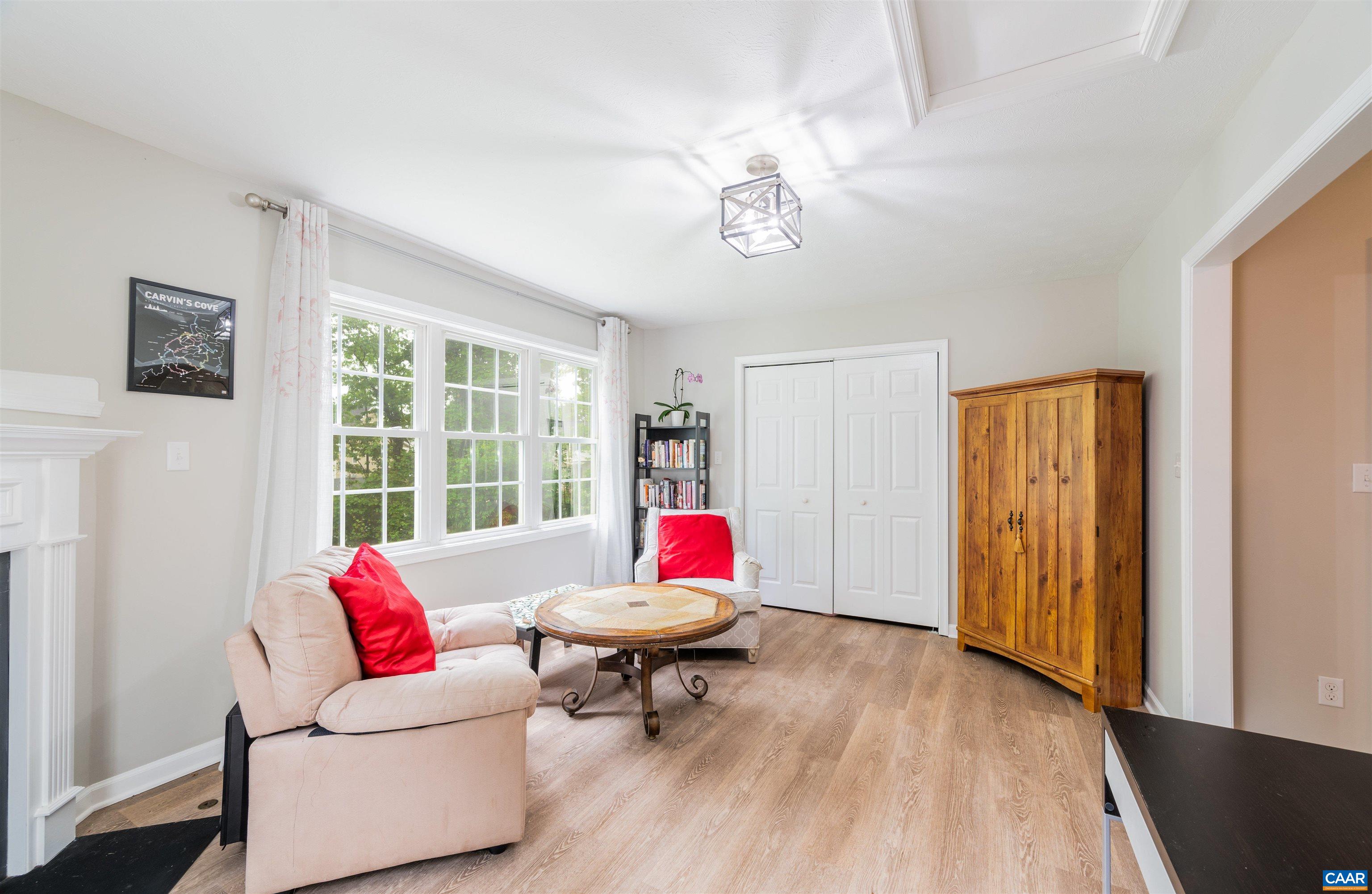 1507 Buck Road Crozet, VA 22932 - Photo 13 of 33 a living room with furniture and a wooden floor