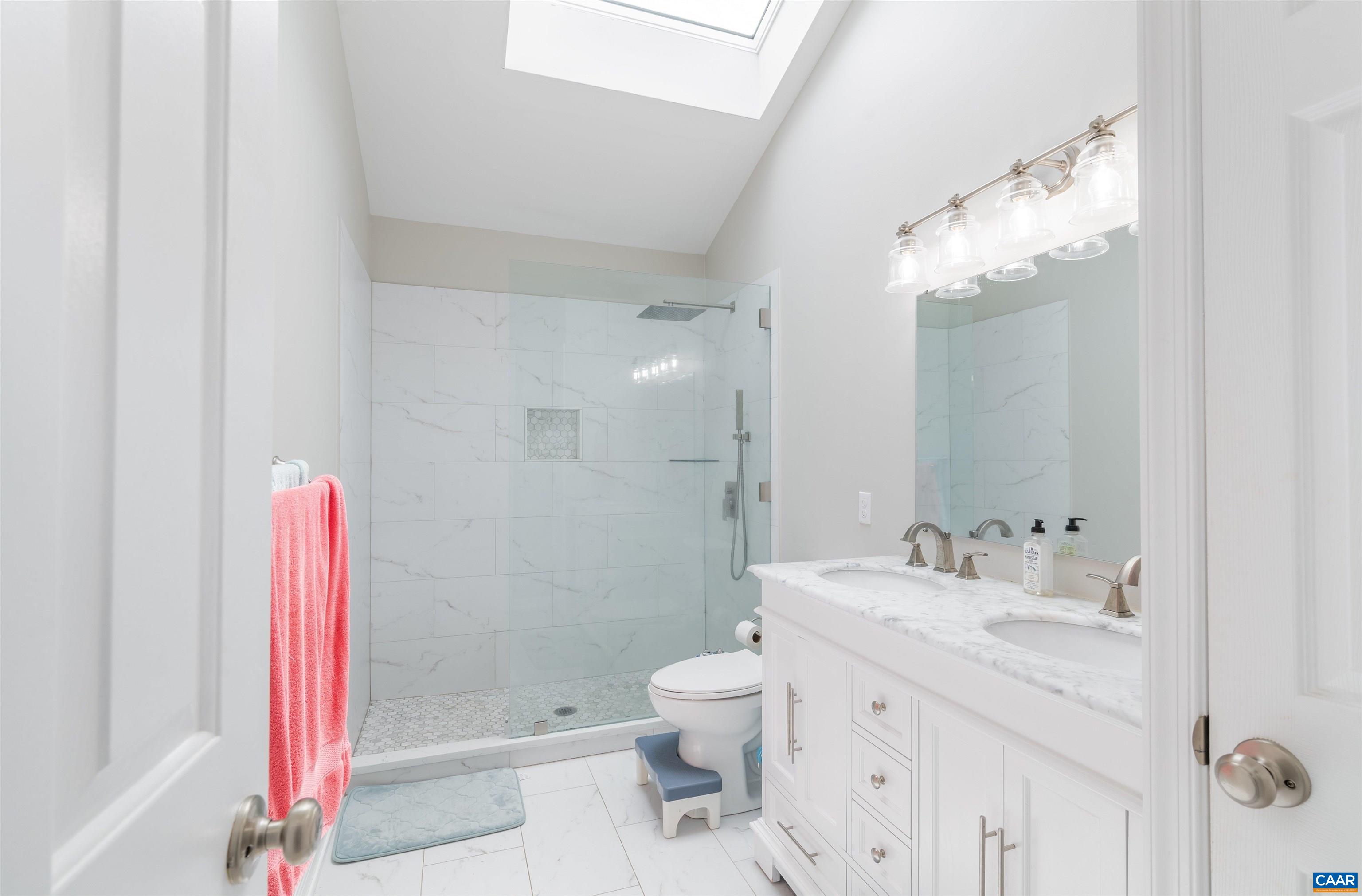 1507 Buck Road Crozet, VA 22932 - Photo 15 of 33 a bathroom with a sink vanity mirror and toilet
