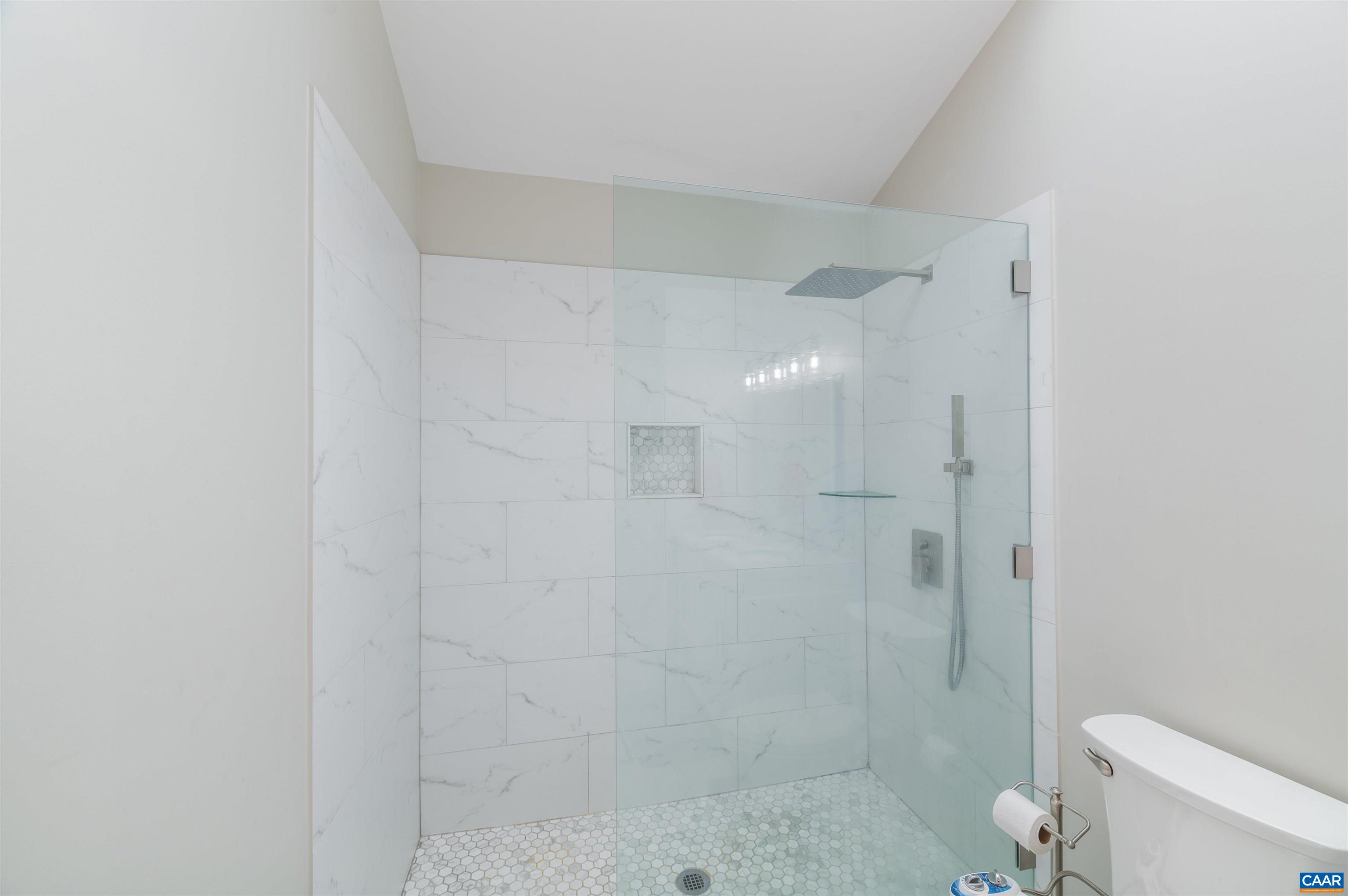 1507 Buck Road Crozet, VA 22932 - Photo 17 of 33 a bathroom with a shower a toilet and sink