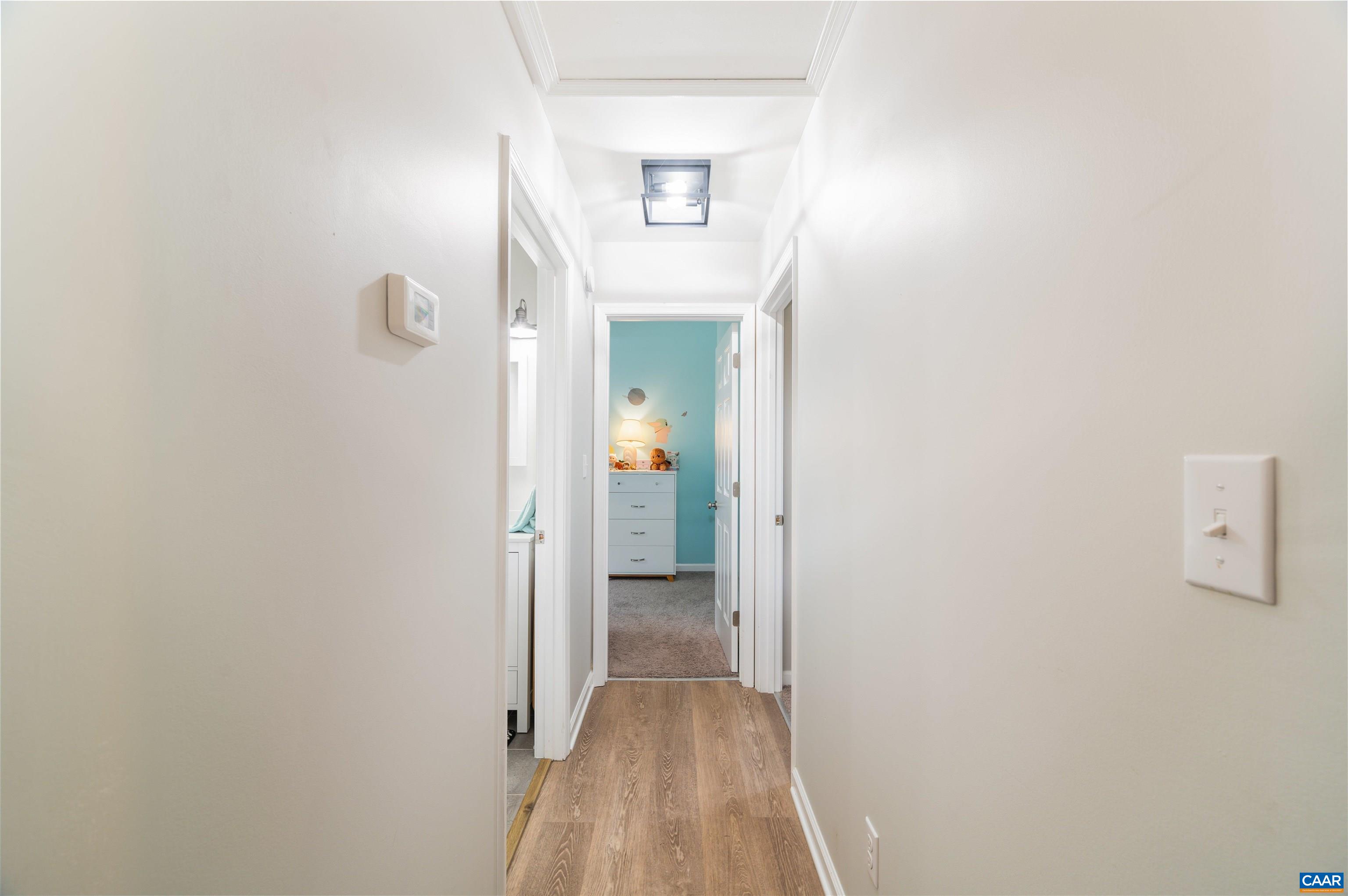 1507 Buck Road Crozet, VA 22932 - Photo 18 of 33 a view of a hallway with wooden floor