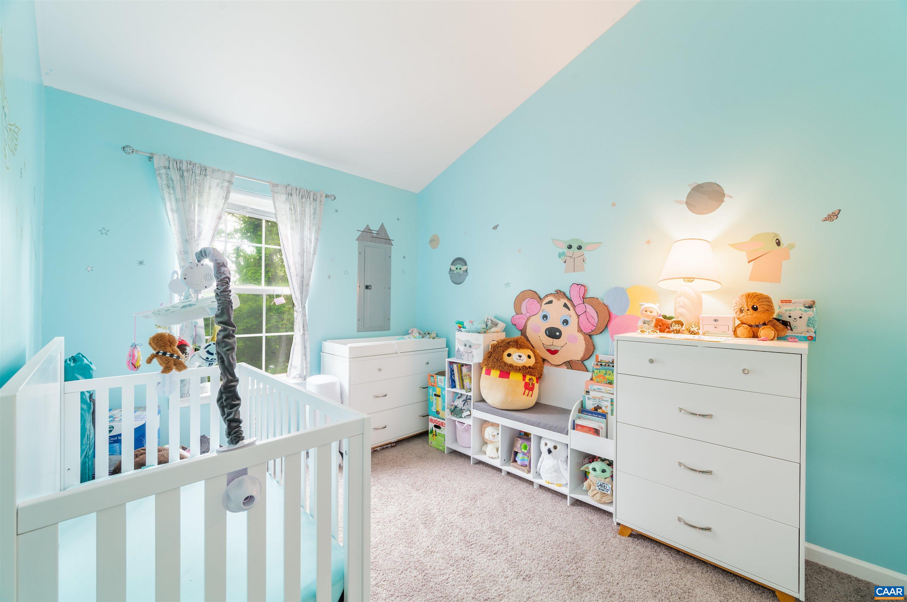 1507 Buck Road Crozet, VA 22932 - Photo 20 of 33 a bedroom with furniture and a baby crib