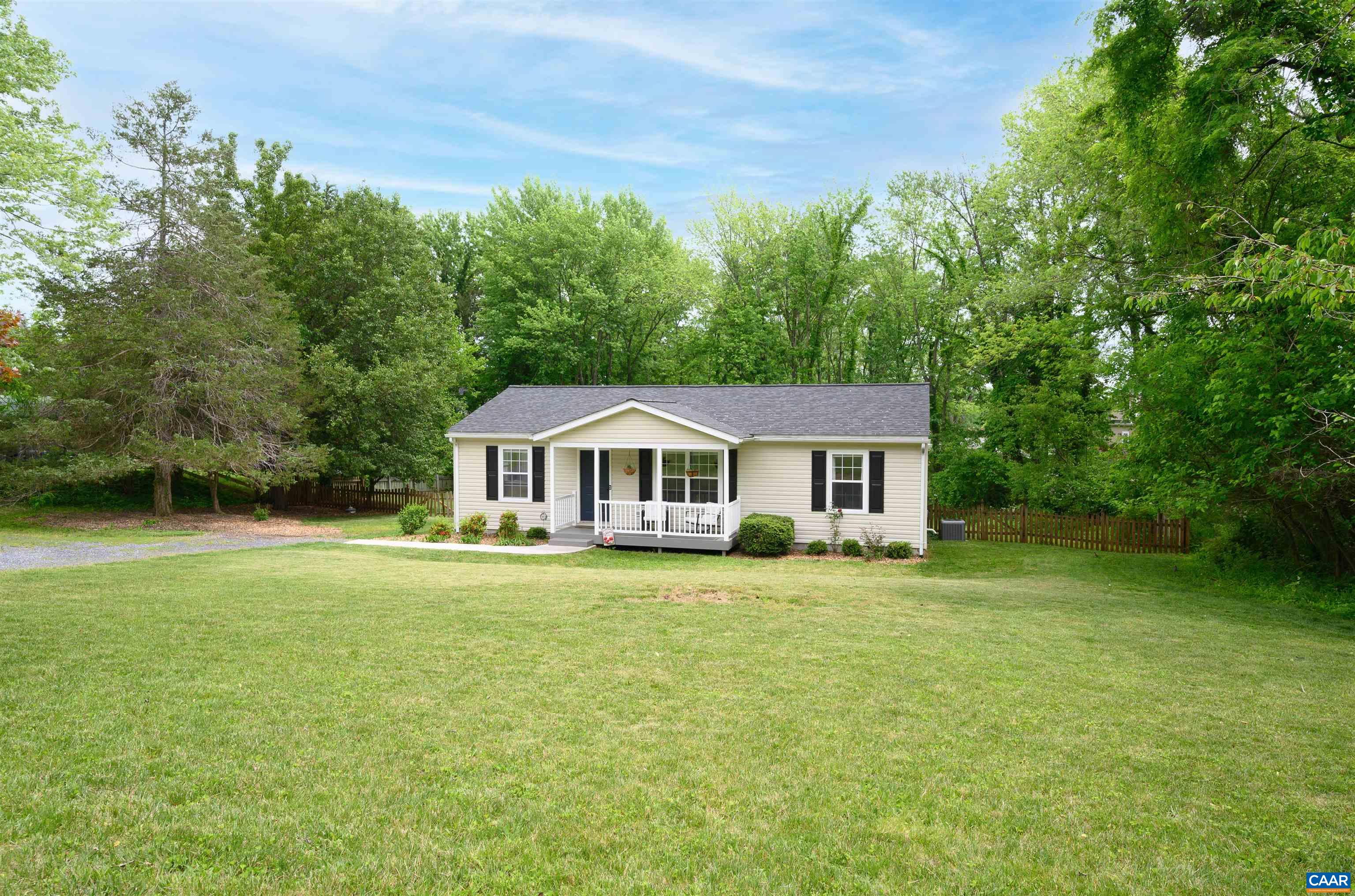 1507 Buck Road Crozet, VA 22932 - Photo 28 of 33 a front view of a house with a garden