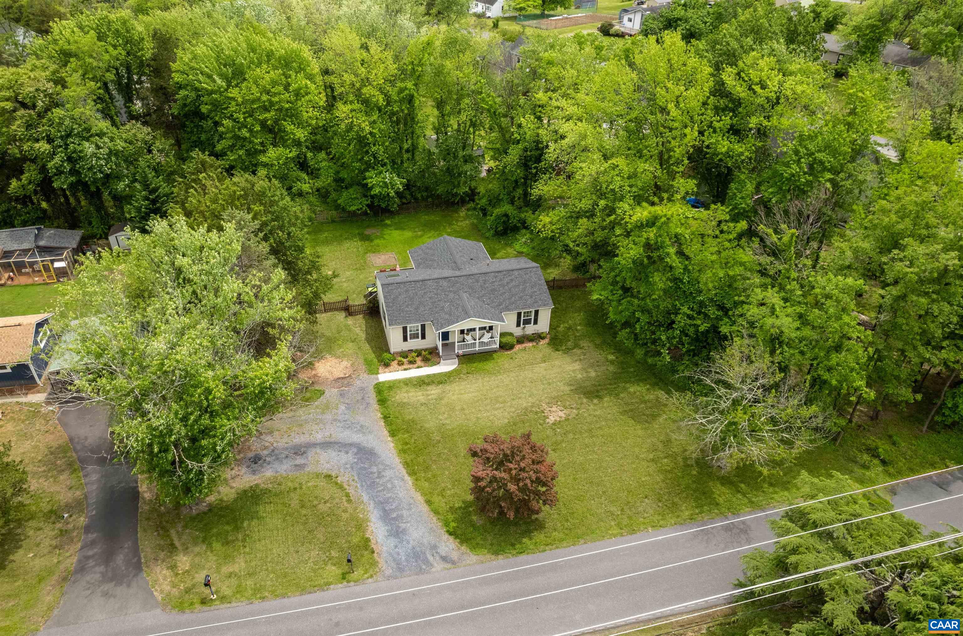 1507 Buck Road Crozet, VA 22932 - Photo 29 of 33 a view of a yard with table and chairs