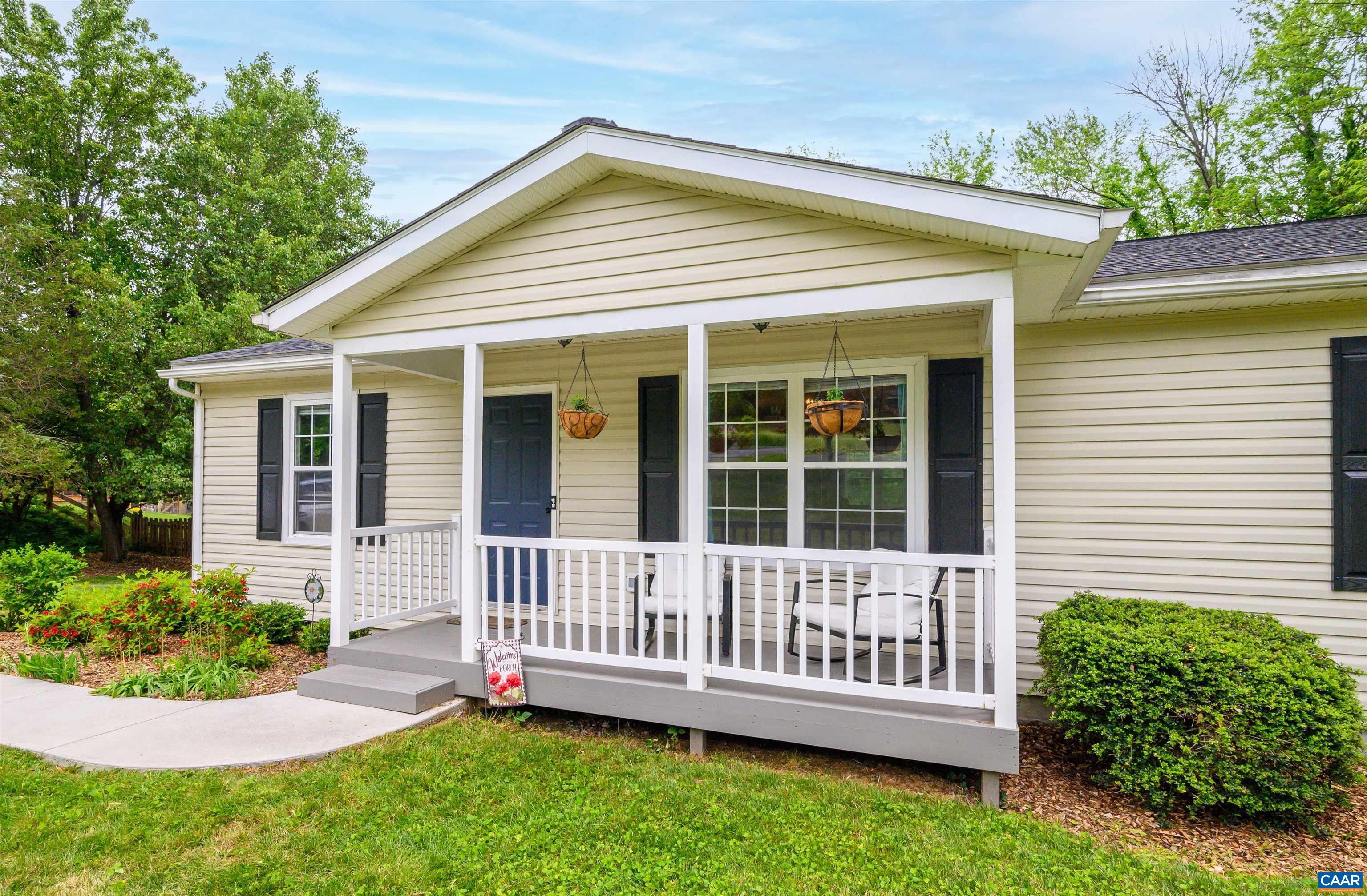 1507 Buck Road Crozet, VA 22932 - Photo 3 of 33 a view of a house with a backyard and deck