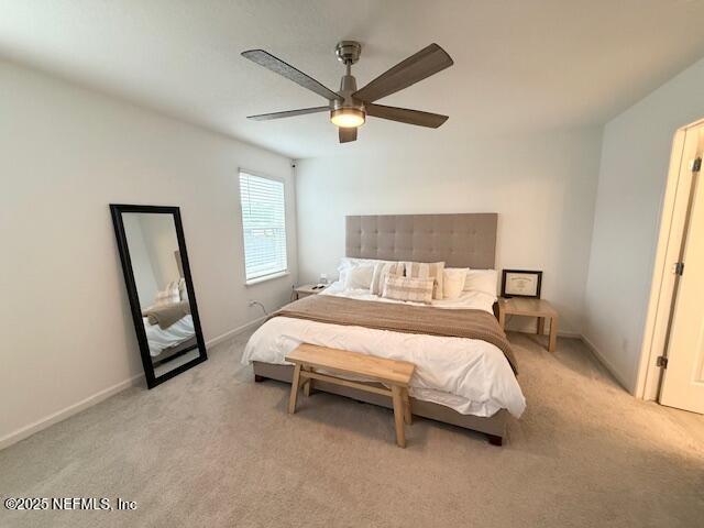 79 Beauclair Boulevard St. Augustine, FL 32084 - Photo 20 of 38 a bedroom with a bed a window and a flat screen tv
