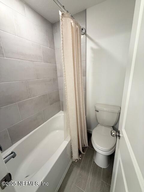 79 Beauclair Boulevard St. Augustine, FL 32084 - Photo 29 of 38 a bathroom with a toilet and a shower