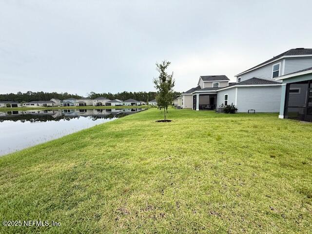 79 Beauclair Boulevard St. Augustine, FL 32084 - Photo 36 of 38 a view of a house with a yard and lake view