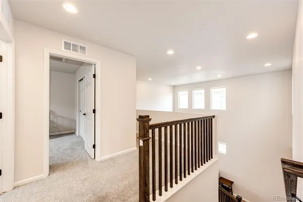a view of hallway with stairs