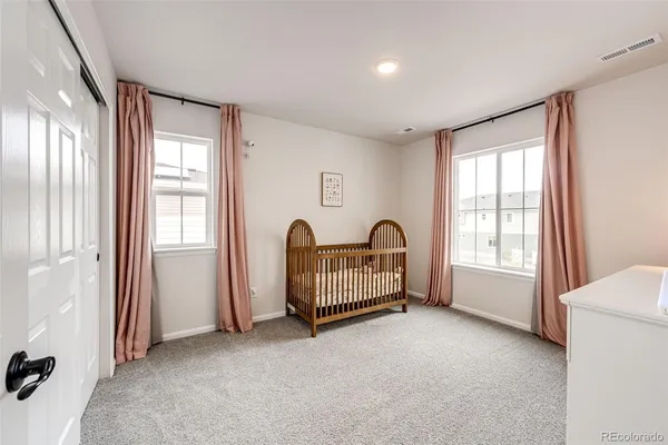 a view of livingroom with hardwood floor and windows