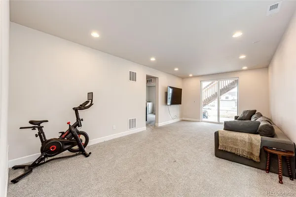 a room with furniture and a window