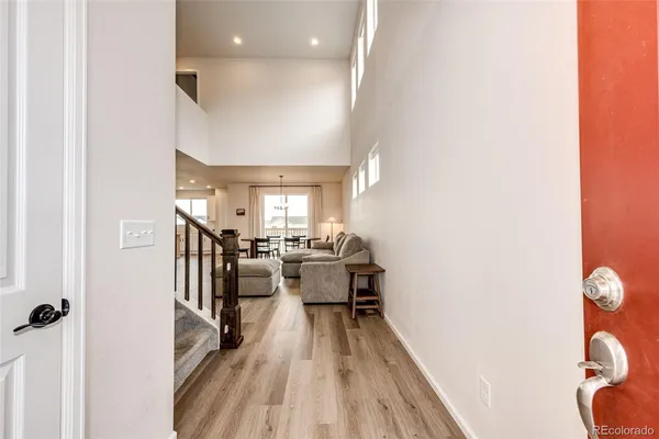 a view of a living room and dining room