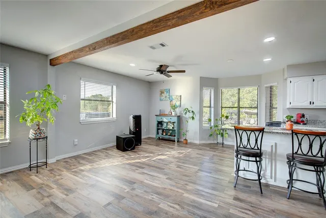 a living room with furniture and a table