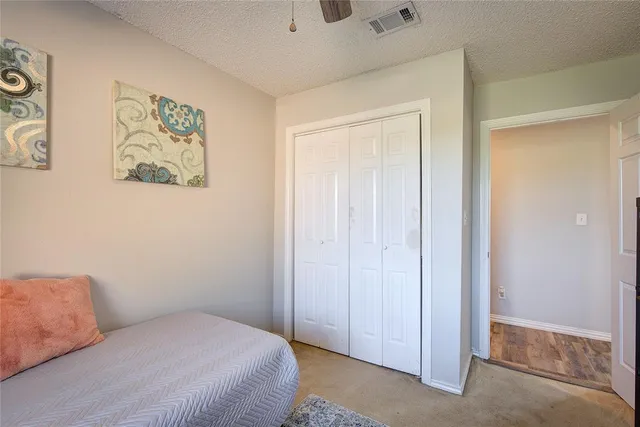 a room with furniture and a flat screen tv