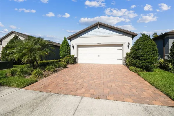 a house with trees in front of it