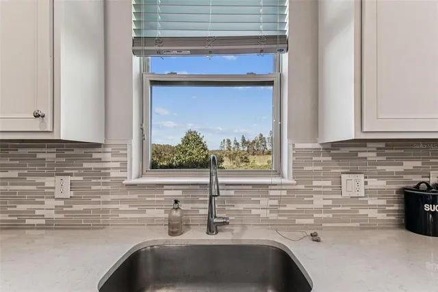 a en suite bathroom with a sink a toilet and shower
