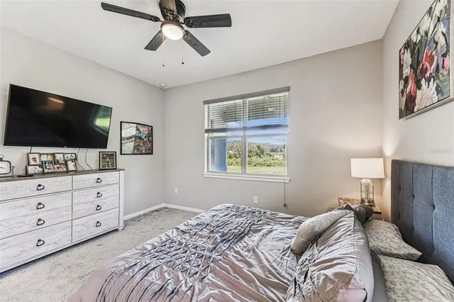 a view of a hallway view with wooden floor and furniture