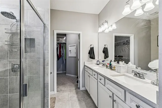 a view of a livingroom with workspace and a couch