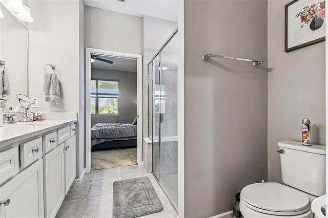 a view of a workspace with furniture and wooden floor