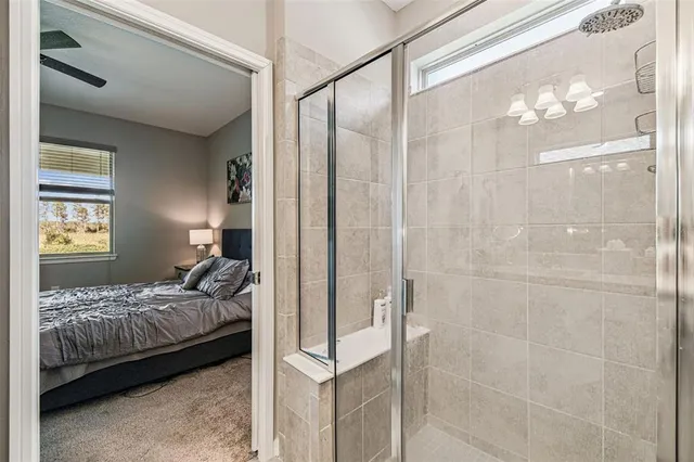 a view of a house with yard and tree s