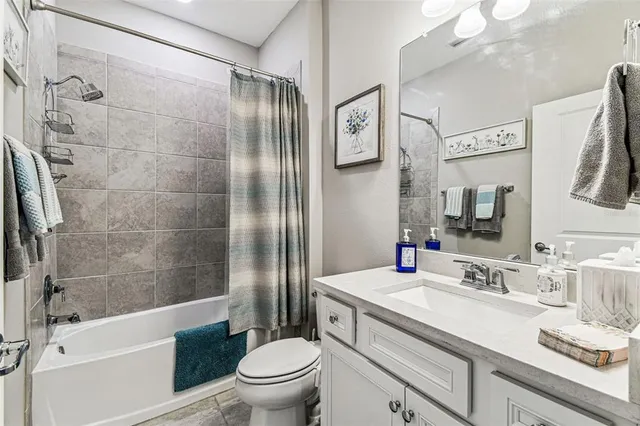 an aerial view of a house with a garden