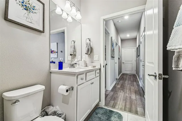 an aerial view of a houses with a lake view