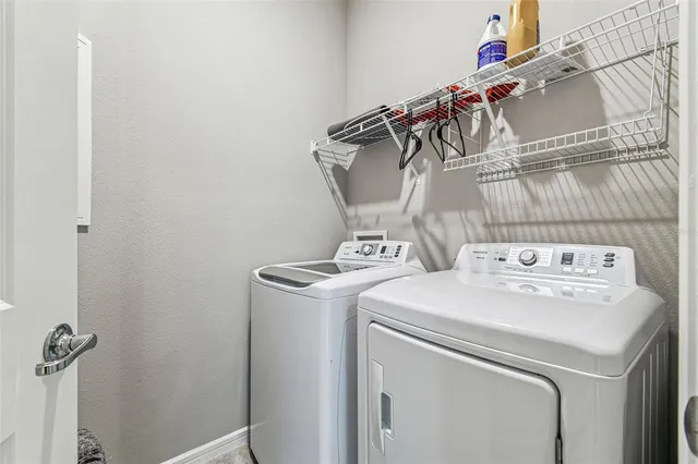 an aerial view of a house with a swimming pool