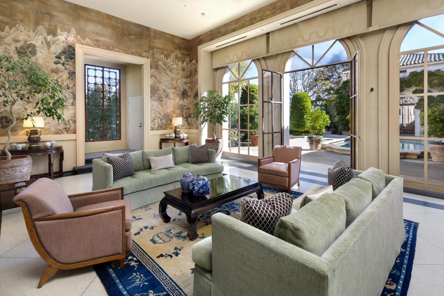 891 Crystal Springs Road Hillsborough, CA 94010 - Photo 11 of 20 a living room with furniture and a large window