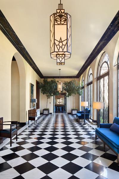 891 Crystal Springs Road Hillsborough, CA 94010 - Photo 4 of 20 a room with lots of white furniture and wooden floor