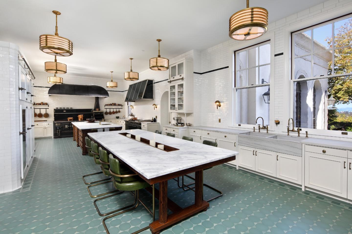 891 Crystal Springs Road Hillsborough, CA 94010 - Photo 9 of 20 a large kitchen with a table and chairs