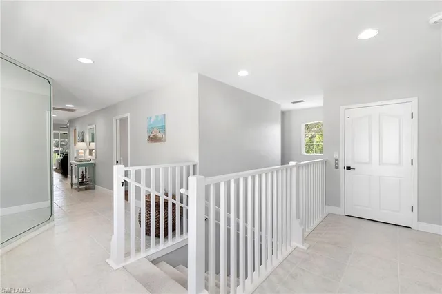 a dining room with a table and chairs