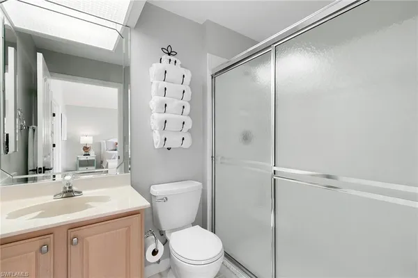 a view of a hallway with bedroom and entryway